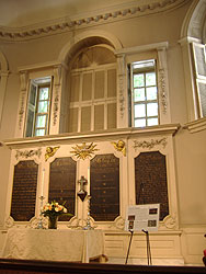 The front of the church looks old and very spiritual.