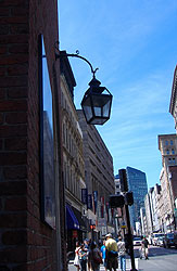 More contrasts - Aged buildings, old lights and new architecture.