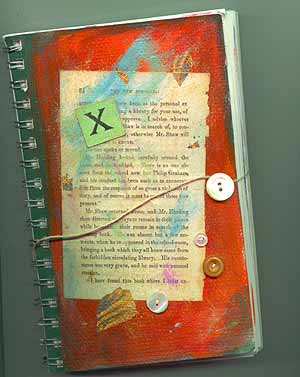 button and string tie on an art journal cover